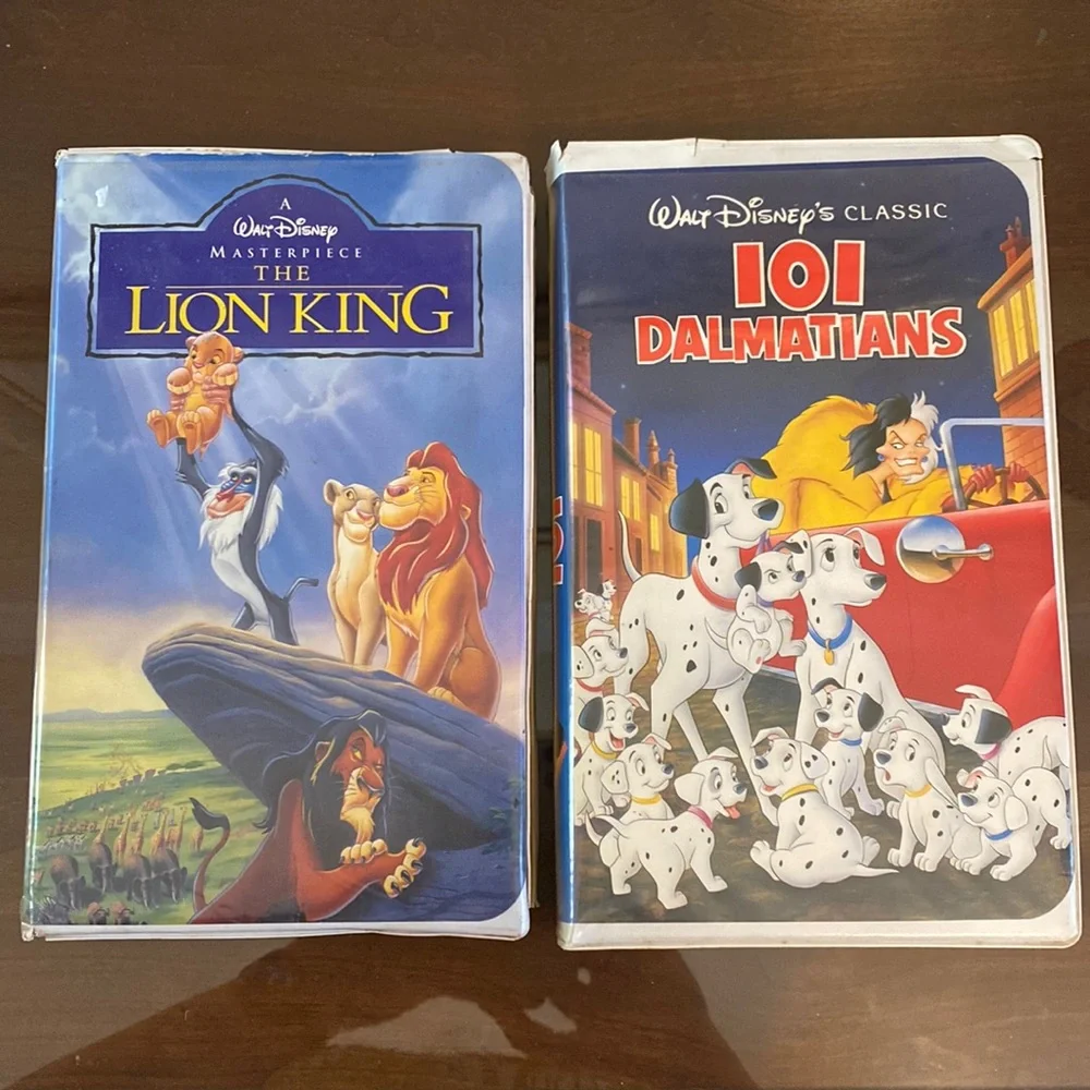 The Lion King VHS and 101 Dalmatians VHS